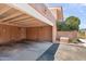 Carport view showcasing covered parking with multiple storage units at 841 E Peoria Ave # 2, Phoenix, AZ 85020