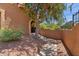 Exterior view of the home featuring a shady front entrance and desert landscaping at 841 E Peoria Ave # 2, Phoenix, AZ 85020