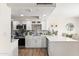 Modern kitchen featuring stainless steel appliances, light countertops, and ample storage at 841 E Peoria Ave # 2, Phoenix, AZ 85020