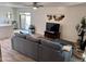 Inviting living room showcases a large sectional sofa, modern decor, and seamless access to the outdoor patio at 841 E Peoria Ave # 2, Phoenix, AZ 85020