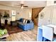 Stylish living room featuring a comfortable sofa, modern lighting, and tile flooring at 841 E Peoria Ave # 2, Phoenix, AZ 85020