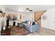 Open living room with comfortable seating, statement art, and bright, airy feel at 841 E Peoria Ave # 2, Phoenix, AZ 85020