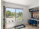 Bright office space with a large window showcasing scenic outdoor views at 841 E Peoria Ave # 2, Phoenix, AZ 85020
