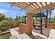 Charming patio with pergola offering shade, outdoor dining area and well maintained landscaping at 841 E Peoria Ave # 2, Phoenix, AZ 85020