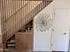 Staircase featuring wooden railings and built-in shelves, adding character and functionality to the space at 841 E Peoria Ave # 2, Phoenix, AZ 85020