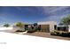Modern residence boasting clean lines, a two-car garage, and thoughtfully designed landscaping, enhancing curb appeal at 8618 E Irish Hunter Trl, Scottsdale, AZ 85258