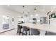 Bright kitchen with stainless appliances, a large island, and seamless access to an outdoor patio at 9028 E Altadena Ave, Scottsdale, AZ 85260