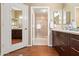 Well-appointed bathroom featuring a tiled walk-in shower and a spacious vanity with double sinks at 9550 E Thunderbird Rd # 152, Scottsdale, AZ 85260