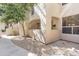 Attractive condo building featuring a private patio area and well-maintained landscaping at 9550 E Thunderbird Rd # 152, Scottsdale, AZ 85260
