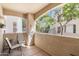 Inviting covered patio with neutral tones and seating area, perfect for relaxing outdoors at 9550 E Thunderbird Rd # 152, Scottsdale, AZ 85260