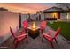 Inviting backyard features a cozy fire pit and outdoor seating, perfect for evening relaxation and entertainment at 1027 S Siesta Ln, Tempe, AZ 85281