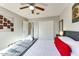 Bright bedroom featuring a ceiling fan, closet, and decor at 1027 S Siesta Ln, Tempe, AZ 85281