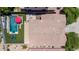A bird's eye view of the home's roof, beautiful pool, patio, and backyard at 10430 W Los Gatos Dr, Peoria, AZ 85383