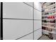 This walk-in closet boasts storage shelves for shoes and accessories, ensuring optimal organization at 10430 W Los Gatos Dr, Peoria, AZ 85383