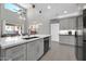 This bright kitchen features an island, stainless steel appliances and views of the backyard at 10430 W Los Gatos Dr, Peoria, AZ 85383