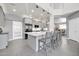 Bright kitchen with a large island, pendant lighting, and stainless steel appliances at 10430 W Los Gatos Dr, Peoria, AZ 85383