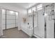 This bathroom includes a shower, a soaking tub, and a private storage closet in a peaceful well-lit setting at 10430 W Los Gatos Dr, Peoria, AZ 85383
