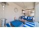 Inviting patio with comfortable seating area, stylish decor, and cozy outdoor heater at 10430 W Los Gatos Dr, Peoria, AZ 85383