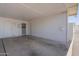 The covered carport offers protection from the elements with direct access to the front door at 10520 W Coggins Dr, Sun City, AZ 85351