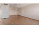 Spacious living room with hardwood floors and a ceiling fan at 10520 W Coggins Dr, Sun City, AZ 85351