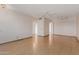 Spacious living room featuring hardwood floors and a ceiling fan at 10520 W Coggins Dr, Sun City, AZ 85351