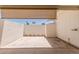 The enclosed courtyard patio offers ample space for outdoor seating and privacy at 10520 W Coggins Dr, Sun City, AZ 85351