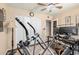 The bedroom boasts wood floors, a ceiling fan, and a closet with paneled doors at 10820 N 45Th Dr, Glendale, AZ 85304