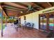 Charming covered patio with tiled flooring, ceiling fans, and relaxing seating arrangements at 10820 N 45Th Dr, Glendale, AZ 85304