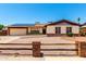 Charming single-story home featuring a well-maintained yard, solar panels, and a two car garage at 10820 N 45Th Dr, Glendale, AZ 85304