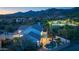 Aerial view of backyard showcases pool, outdoor living area, and mountain views at 11089 N 130Th Pl, Scottsdale, AZ 85259