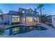 Expansive backyard with refreshing pool, lush landscaping, and covered patio is perfect for outdoor living at 11089 N 130Th Pl, Scottsdale, AZ 85259