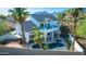 Exterior backyard with a pool, balcony, and lush landscaping at 11089 N 130Th Pl, Scottsdale, AZ 85259