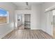 Bright bedroom with sliding closet doors, and a large window with mountain views at 11089 N 130Th Pl, Scottsdale, AZ 85259