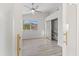 Sunlit bedroom with sliding closet doors, neutral paint, and a serene mountain view at 11089 N 130Th Pl, Scottsdale, AZ 85259