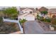 Charming two-story home with three-car garage, desert landscaping, and mountain views at 11089 N 130Th Pl, Scottsdale, AZ 85259