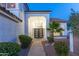Inviting front entrance with decorative double doors and elegant chandelier welcomes you to this stylish home at 11089 N 130Th Pl, Scottsdale, AZ 85259