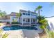 Backyard with a pool, spa, desert landscaping and mature trees at 11089 N 130Th Pl, Scottsdale, AZ 85259