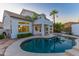 Outdoor pool and jacuzzi with covered patio in private backyard with desert landscape at 11089 N 130Th Pl, Scottsdale, AZ 85259