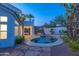 Beautiful outdoor swimming pool and lush landscaping provide a serene and private backyard oasis at 11089 N 130Th Pl, Scottsdale, AZ 85259