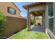 Back yard featuring artificial turf, and a covered patio at 1255 N Arizona Ave # 1300, Chandler, AZ 85225
