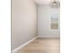 Bright bedroom with a modern light fixture and plantation shutters at 1255 N Arizona Ave # 1300, Chandler, AZ 85225
