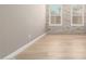 Bedroom with shuttered windows offering natural light and tiled accent wall at 1255 N Arizona Ave # 1300, Chandler, AZ 85225