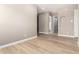 Hallway with wood floors and neutral paint at 1255 N Arizona Ave # 1300, Chandler, AZ 85225