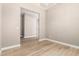 Hallway with wood floors and neutral paint at 1255 N Arizona Ave # 1300, Chandler, AZ 85225