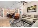 Open-concept living room and kitchen area, perfect for modern living and entertaining guests at 1474 E Locust Dr, Chandler, AZ 85286