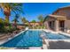 Sparkling pool with spa offers a refreshing retreat in a serene backyard setting at 1474 E Locust Dr, Chandler, AZ 85286