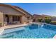 Sparkling pool with spa and outdoor dining creates an inviting backyard for relaxation and entertaining at 1474 E Locust Dr, Chandler, AZ 85286