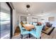 Bright, open dining room with hardwood floors, sliding glass door and seating for 6 at 15225 N 100Th St # 1185, Scottsdale, AZ 85260