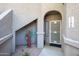 Inviting front entrance with decorative cactus and security door at 15225 N 100Th St # 1185, Scottsdale, AZ 85260
