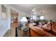 Cozy living room flows to the dining area, showcasing an open concept design at 15225 N 100Th St # 1185, Scottsdale, AZ 85260